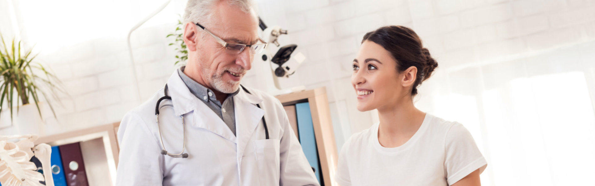 doctor inspecting the patient